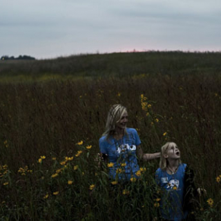 Paul's daughter and granddaughter: Sarah and Sophia Willis in the prairie at dusk