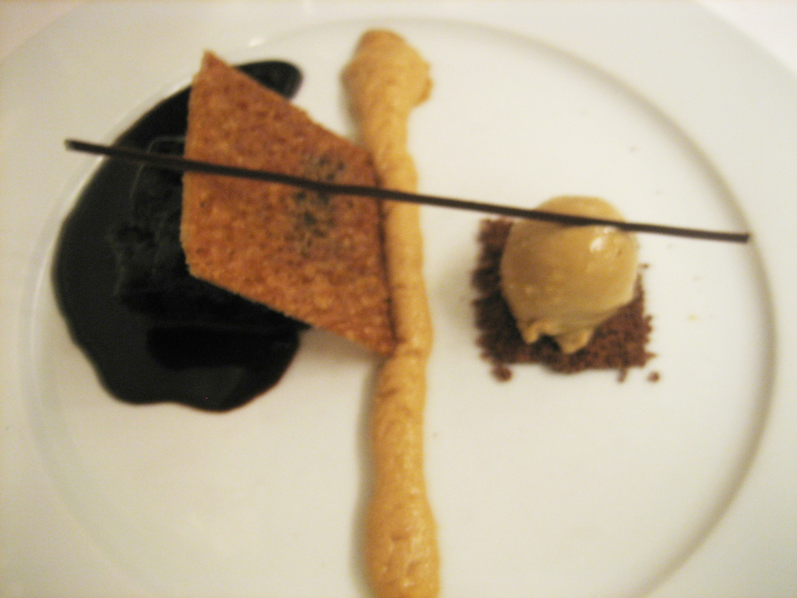 Sticky toffee cake in dark chocolate ganache, oatmeal stout ice cream in a patch of crunchies