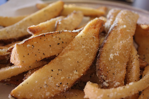 NOLA Fries: thick-cut steak fries showered in parmesan cheese, salt and pepper