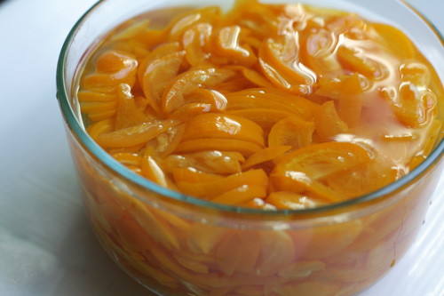 Thinly sliced kumquat soaking in water