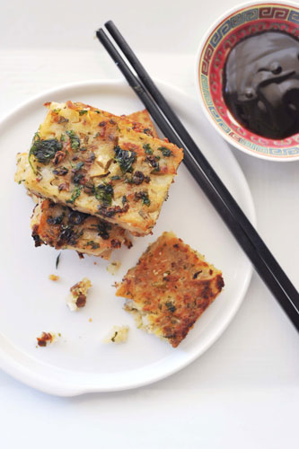 Pan-fried turnip cakes with served with oyster sauce
